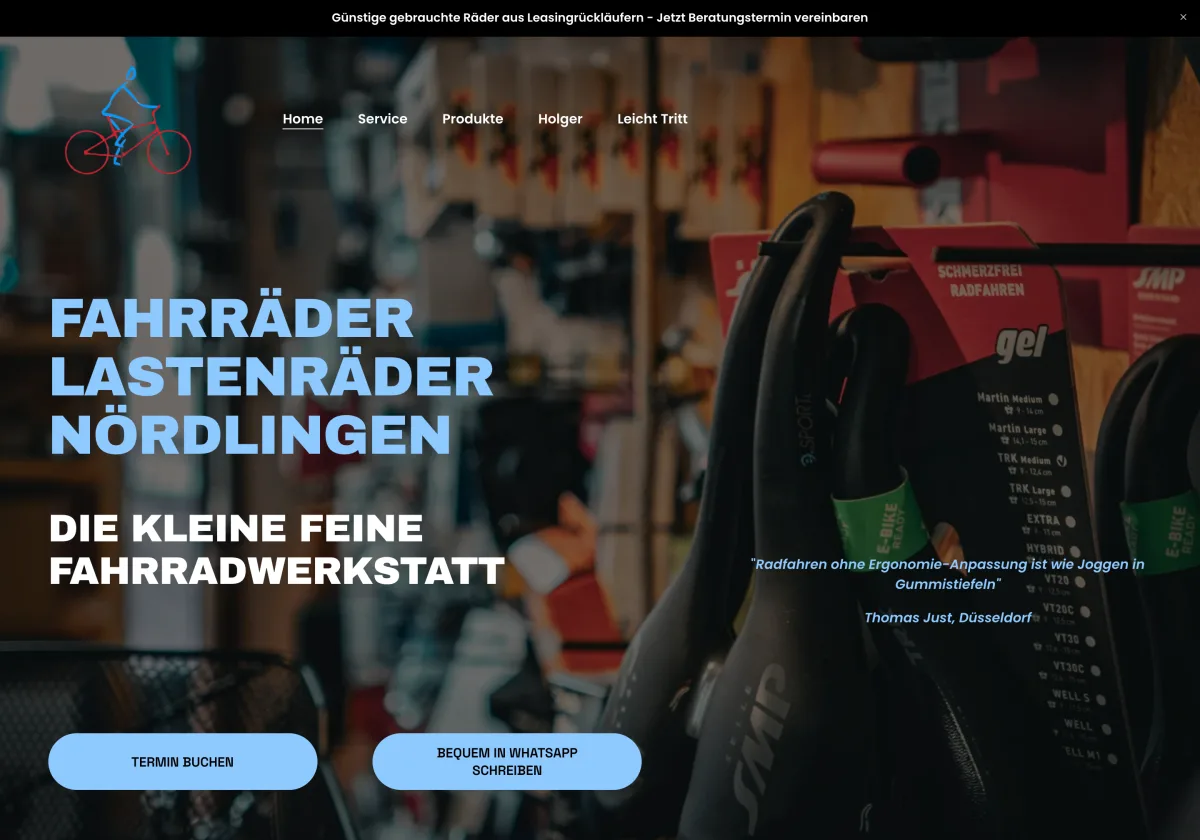 Startseite des Fahrradladens in Nördlingen: großer Schriftzug „Fahrräder Lastenräder Nördlingen“ über einem Foto aus der Werkstatt